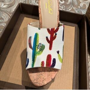 Ariat wedges still in box.  Darling shoes.